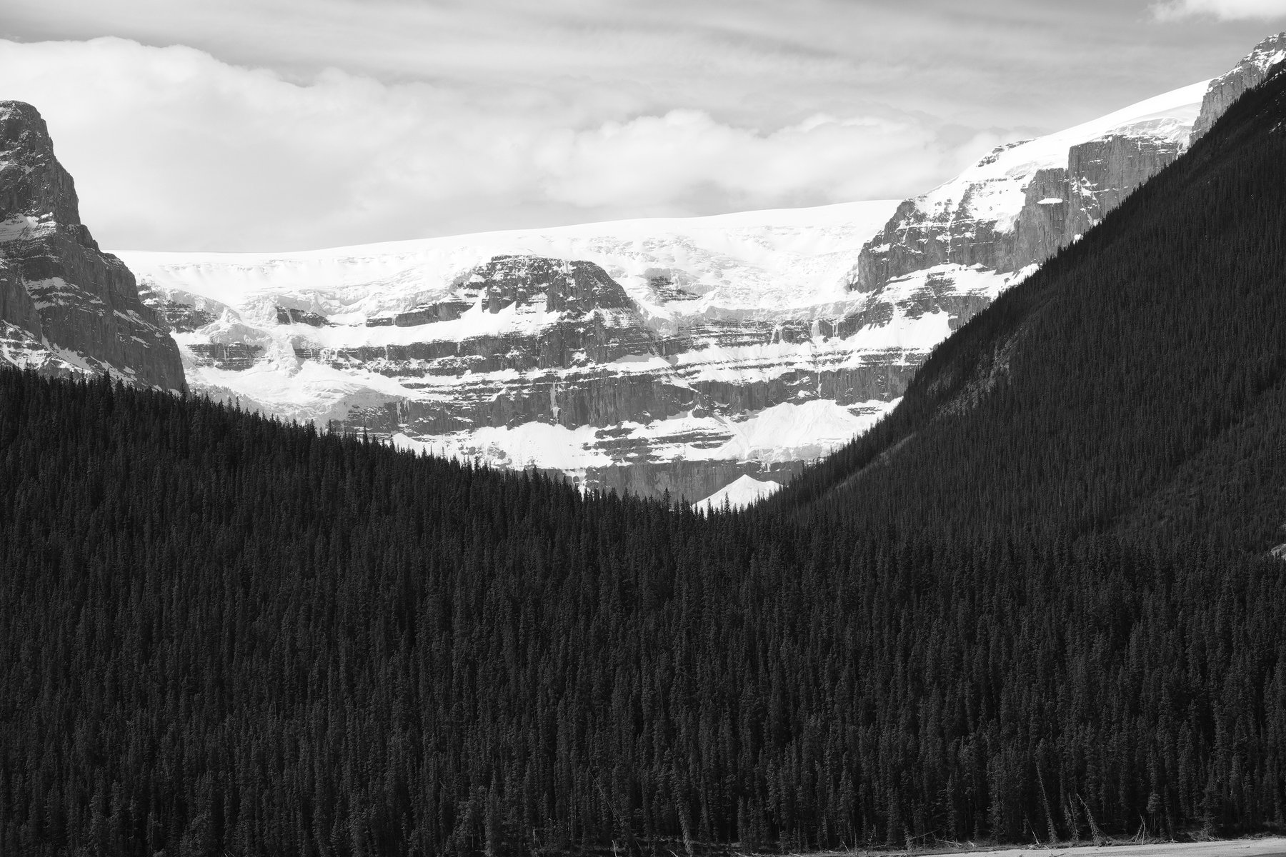 Black and white photo of an Alaska glacier and mountains