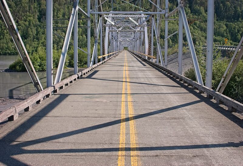 Looking straight down the centerline of the old Knik River steel truss bridge